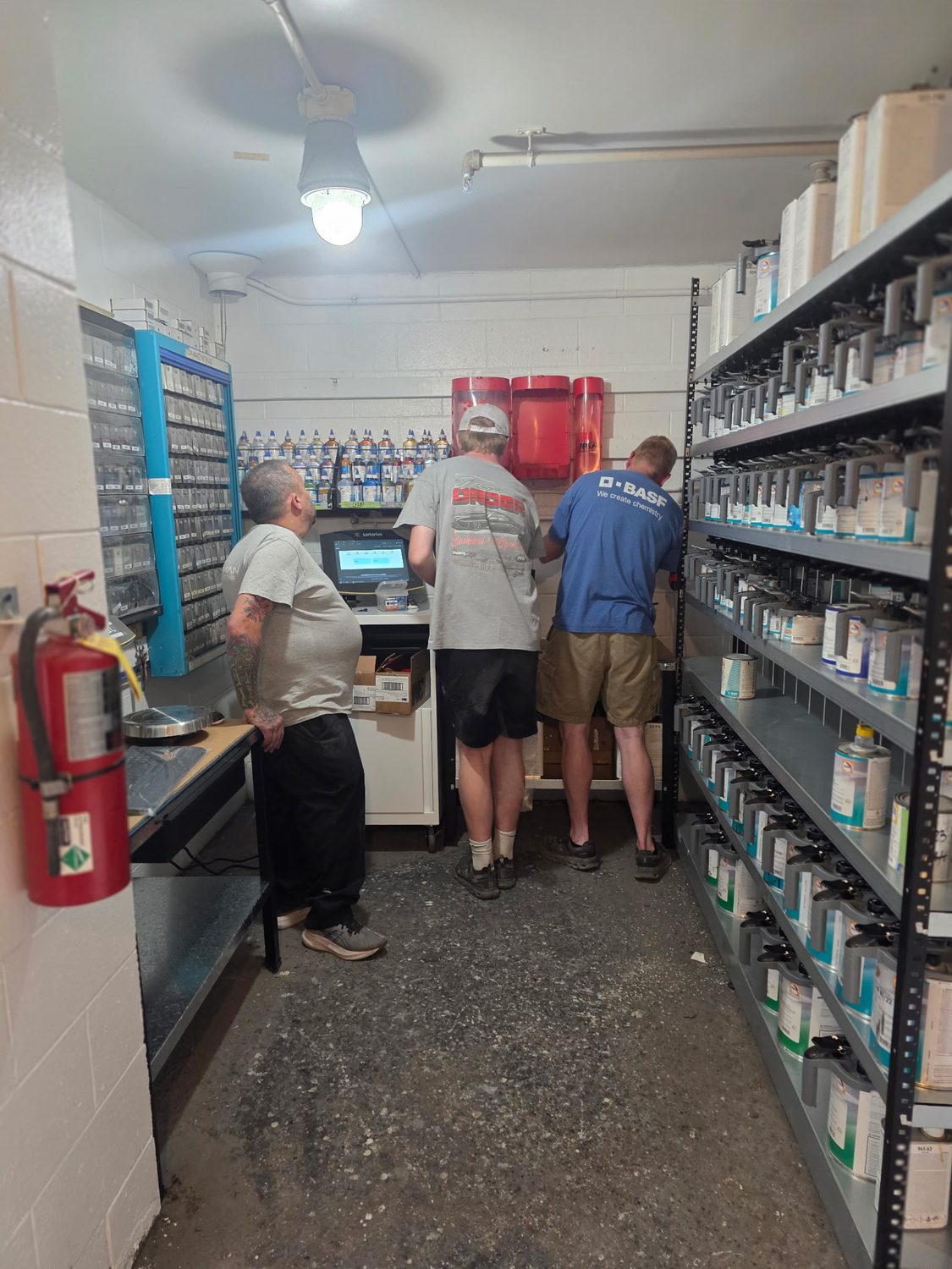 Bob Rohrman Collision painters working at the new BASF Refinity mixing station in Lafayette, Indiana