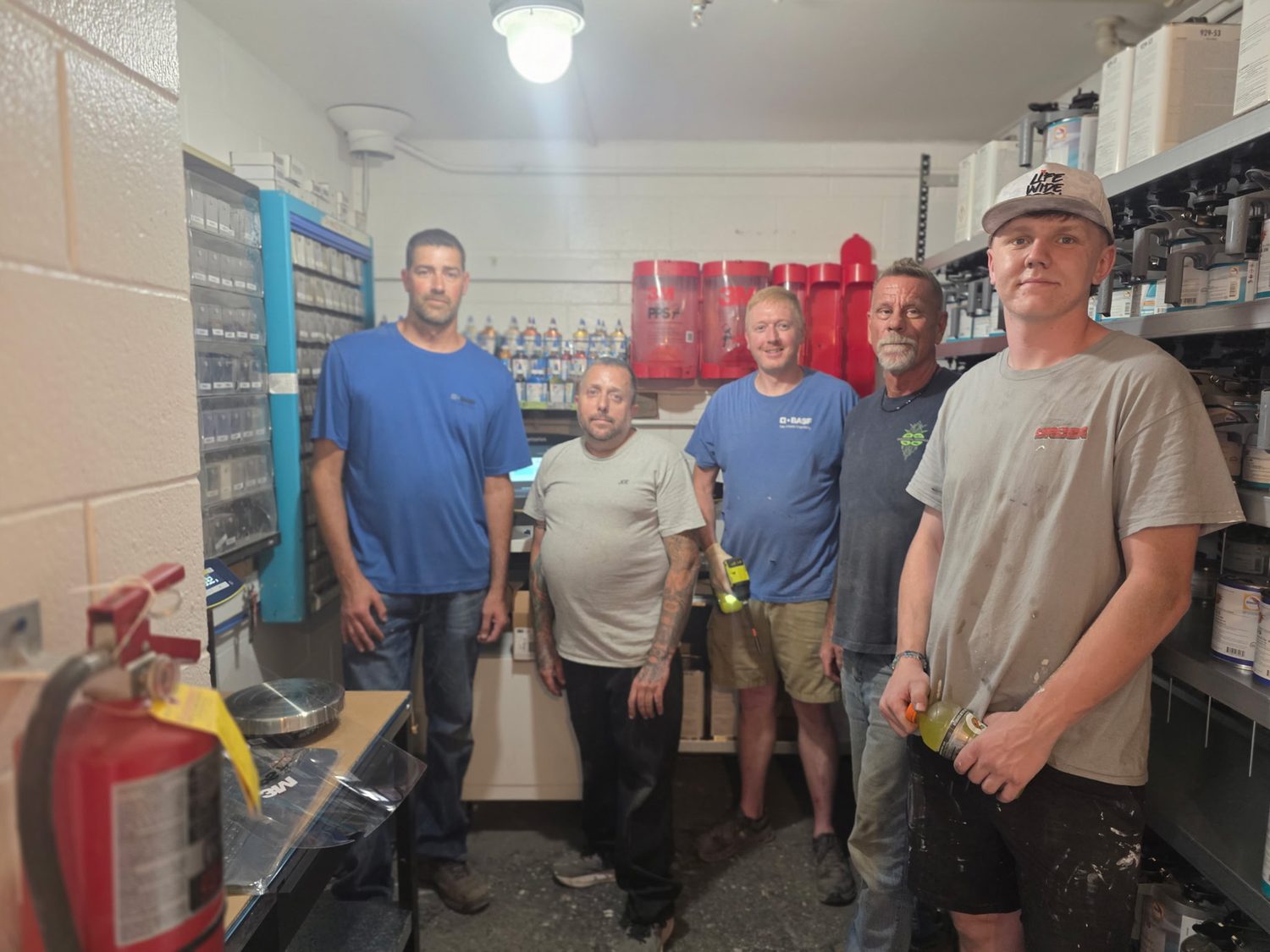 The Bob Rohrman Collision paint team in the remodeled mixing room with new BASF Refinity equipment in Lafayette, Indiana
