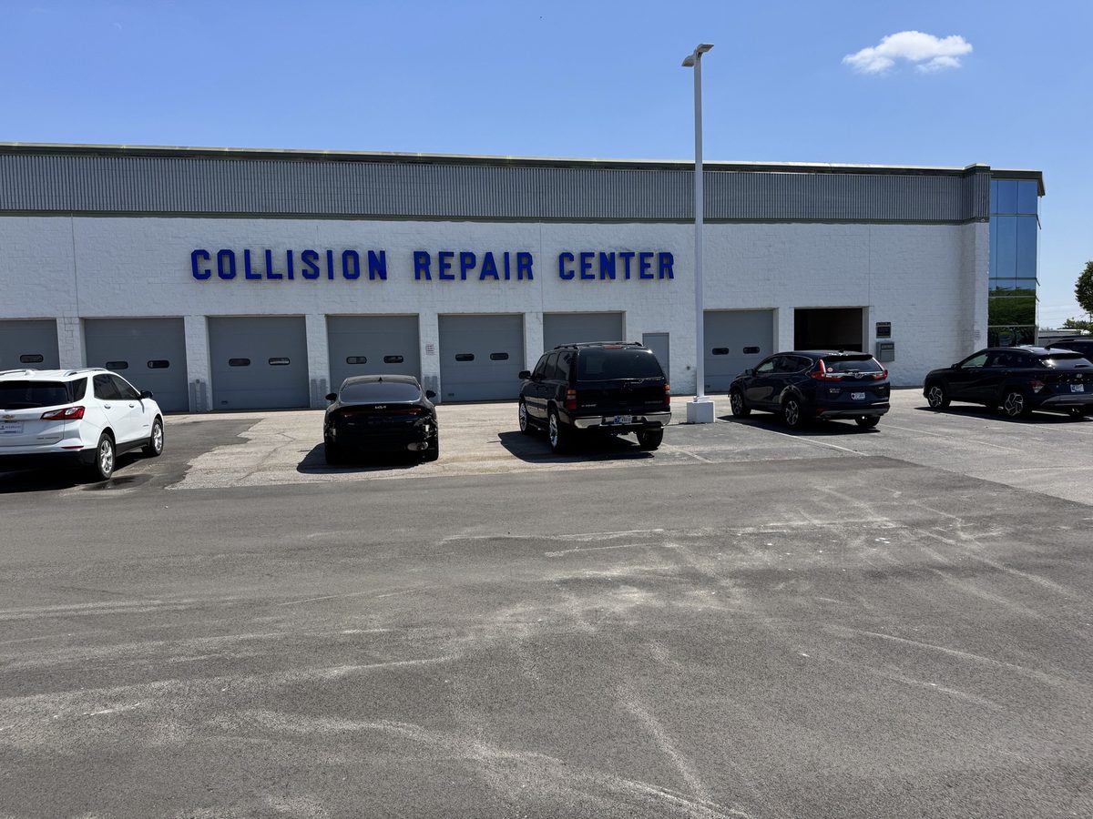Side exterior of the Bob Rohrman Collision facility showing customer entrance in Lafayette IN